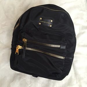 Black and gold backpack